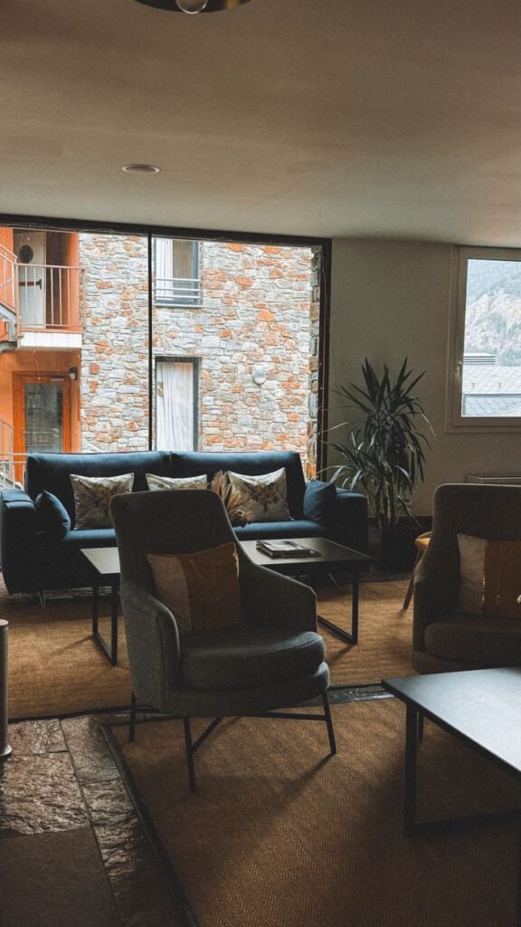 Modern interior with views of rustic stone architecture in Andorra.